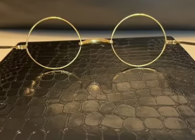 حراج 10 هزار پوندی عینک روکش طلای گاندی